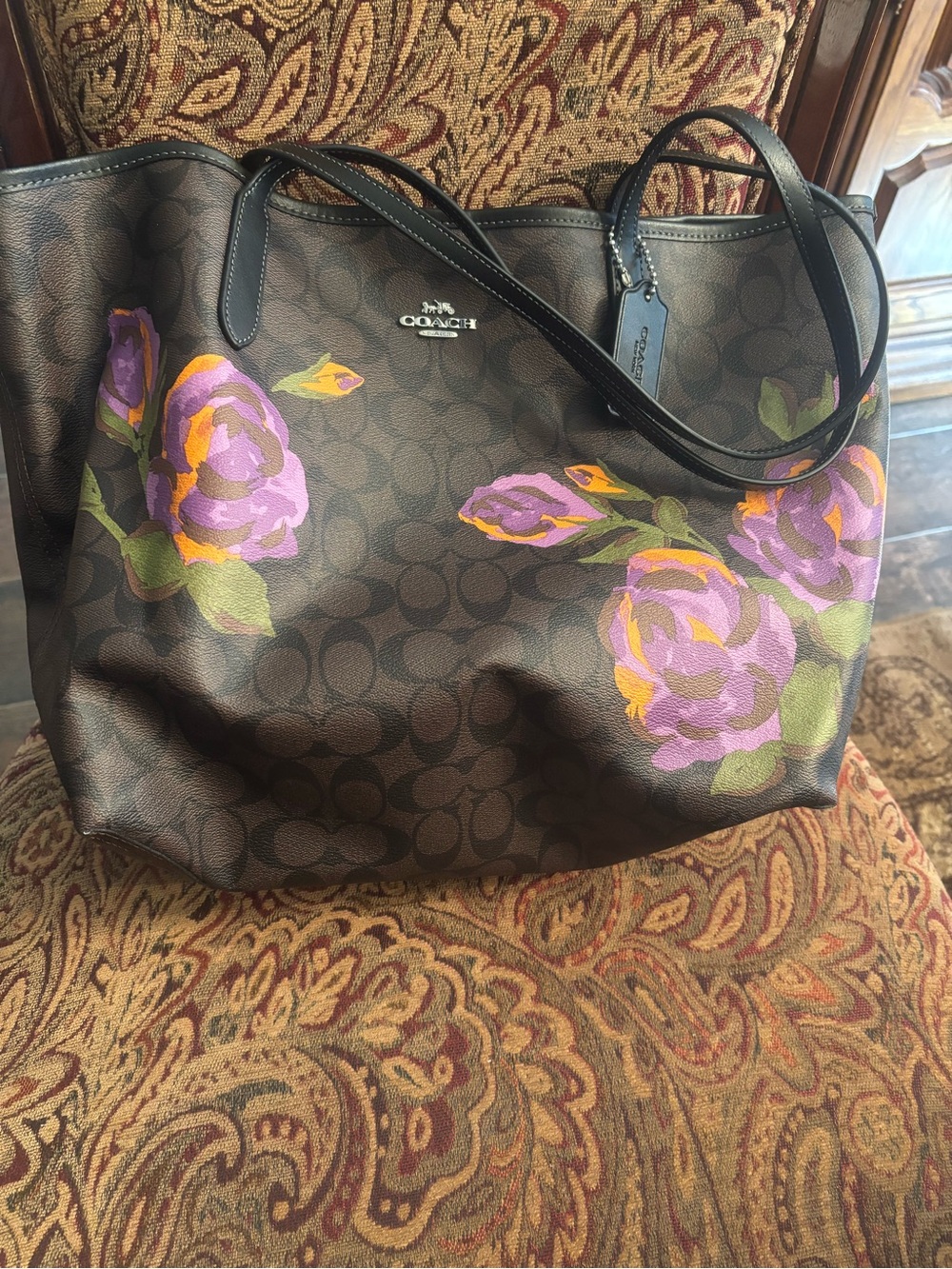 Brand new Coach Brown Signature Tote with Purple and Green Floral Accents